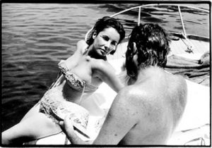 Elizabeth Taylor and Richard Burton on boat 1962.jpg